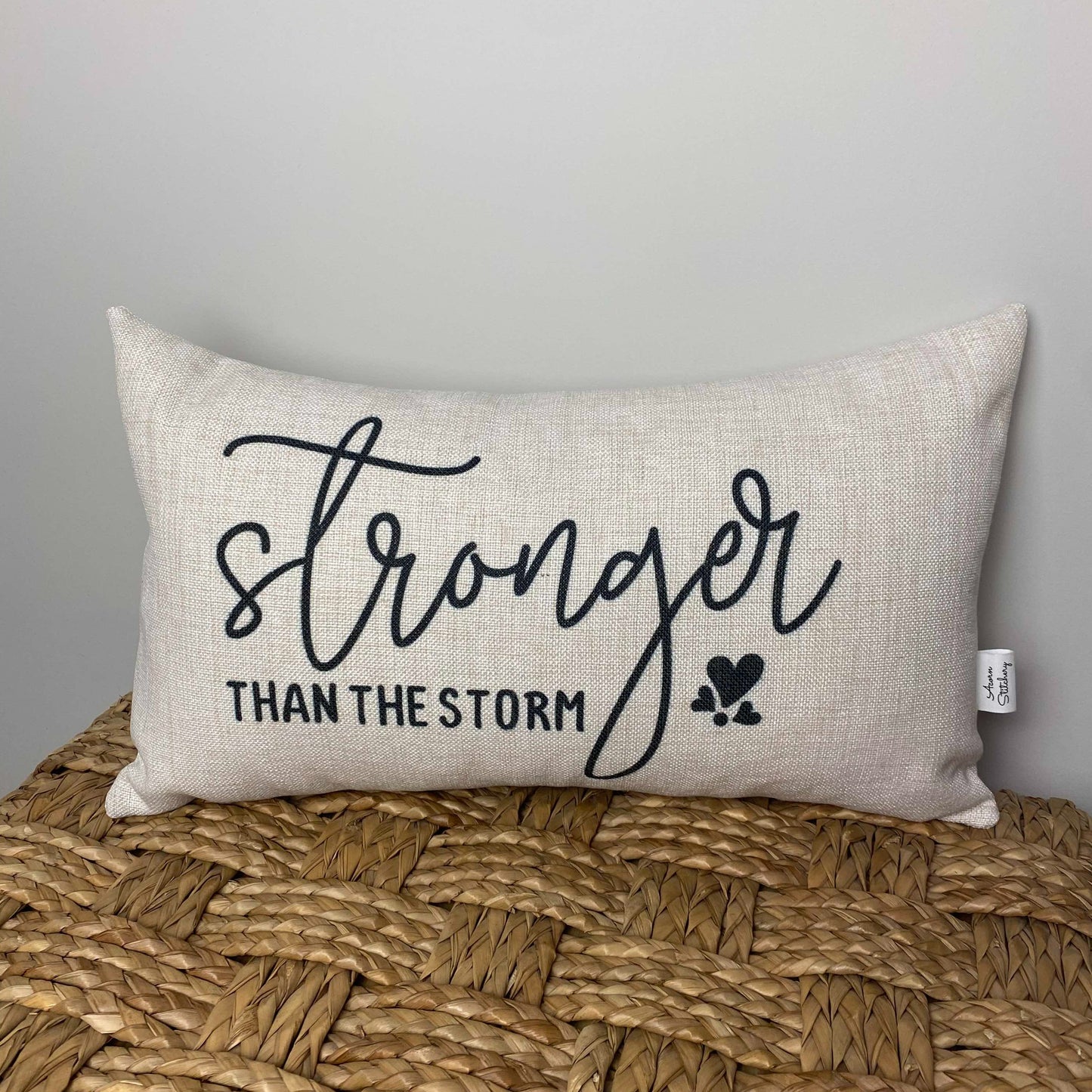 stronger than the storm motivational pillow